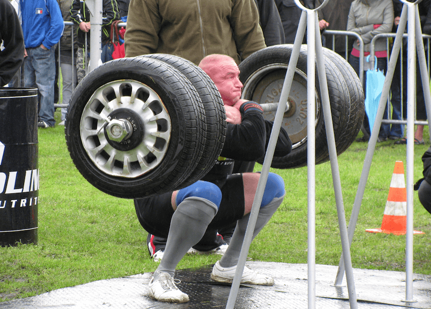 Strongman front squats large tires