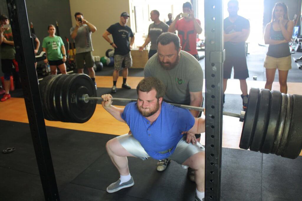 Greg hits parallel in a squat.